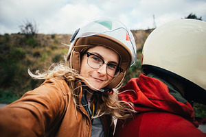 Motorcycle passenger selfie