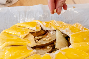 Fruit pastry cooking pie baker hand pine nuts pear, a Person Photo by Photo Drive Studio