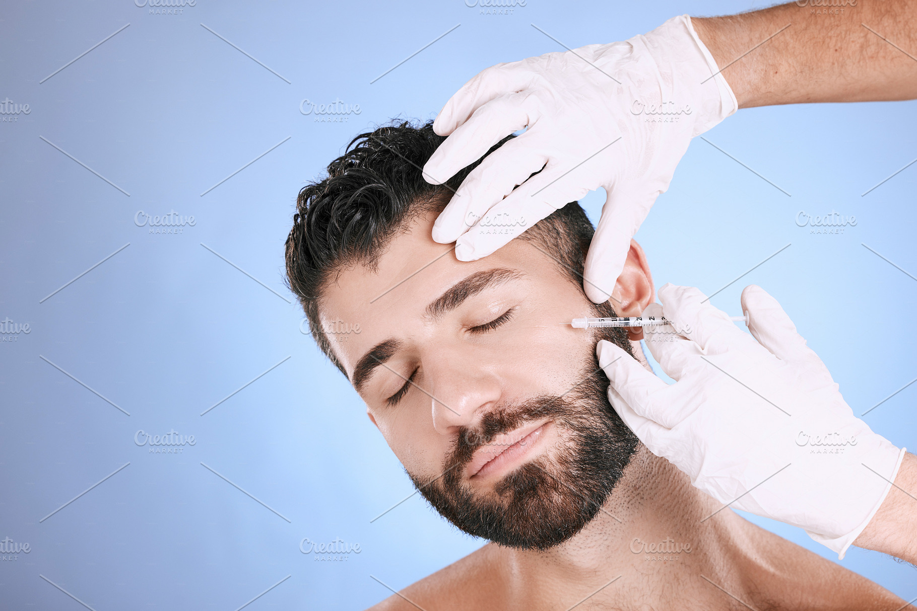 Needle, man and skincare in studio for beauty, botox and aesthetic on mockup background. Plastic surgery, face cosmetics and guy change body with anti aging filler, facial salon or prp transformation, a Photo by Peopleimages.com