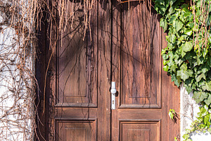Beautiful vintage door with handle in Old Prague, an Architecture Photo by Anna Bogush