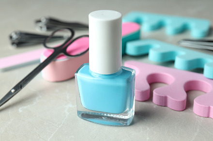 Concept of nail care with manicure accessories on light textured, a Beauty & Fashion Photo by AtlasStudio