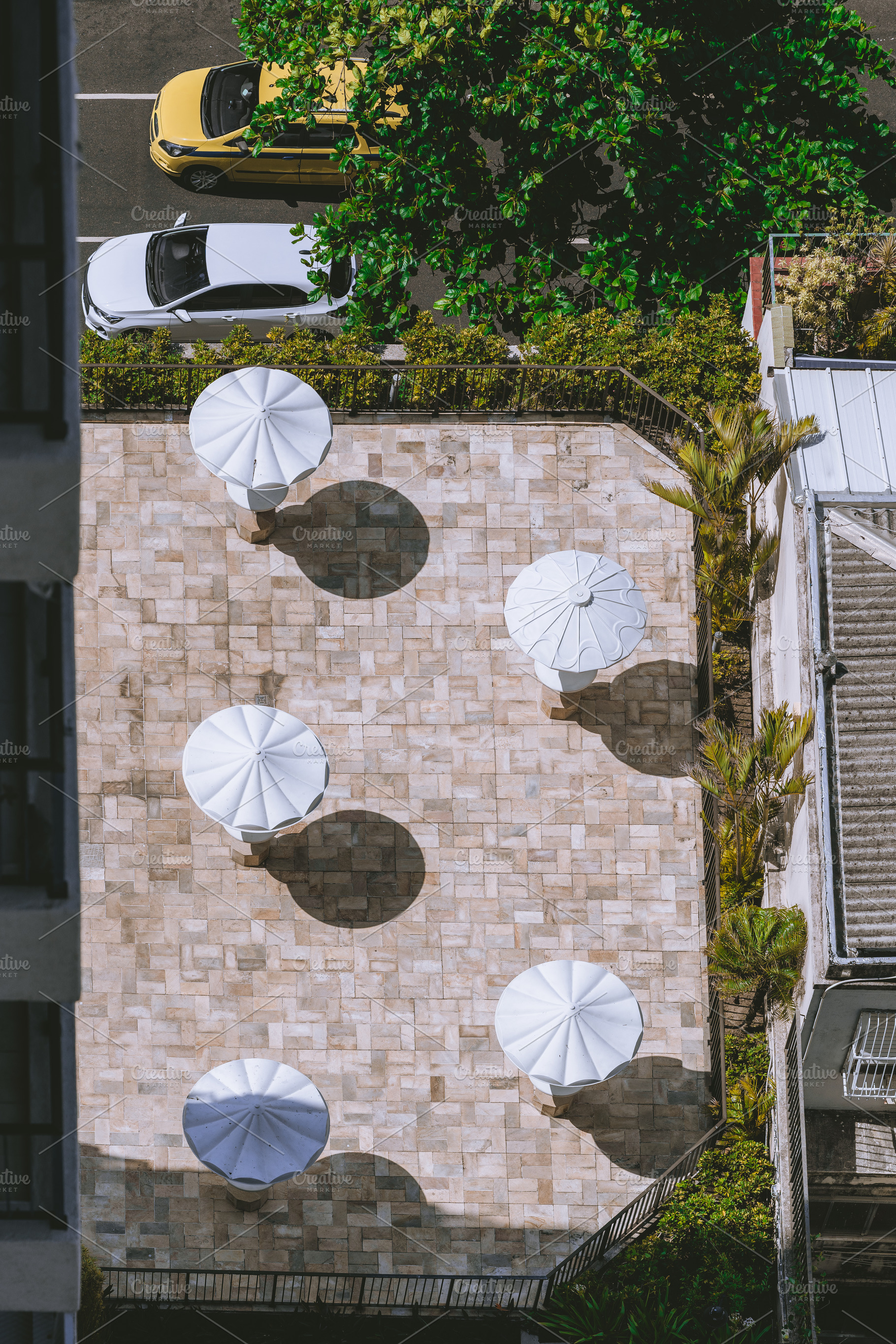 Terrace with white umbrellas, an Industrial Photo by SkyNext