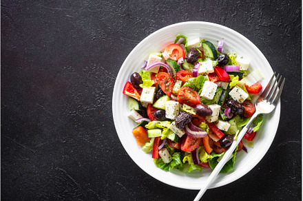 Greek salad with olives at black., a Food & Drink Photo by Nadia-nb