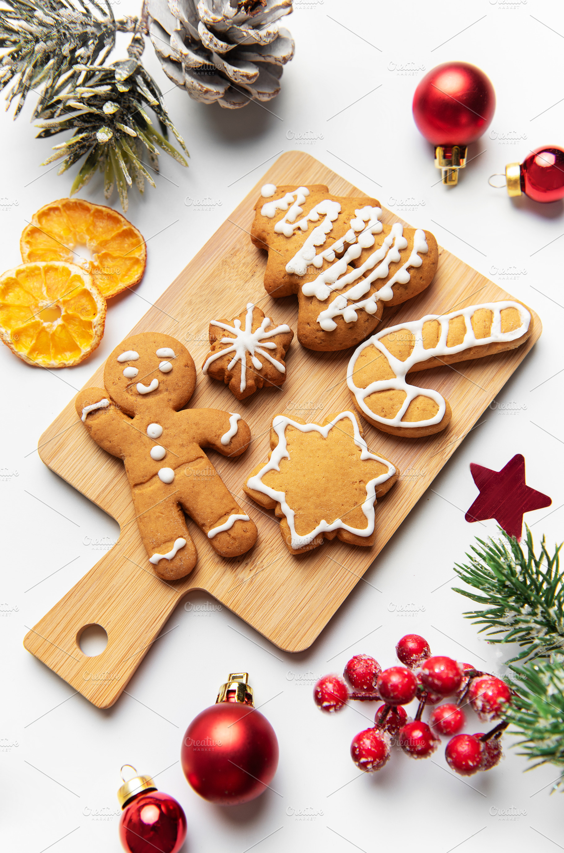 Gingerbread cookies arranged on cutting board with christmas dec, a Holiday Photo by Olena Rudo