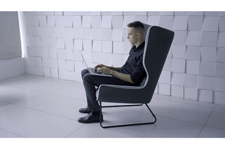 Young man sitting in modern, a Technology Photo by Media Whale Stock