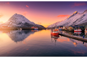 Red fishing boats on the sea, snowy, a Transportation Photo by den-belitsky