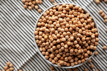 Dry Organic Chickpeas in a Bowl, top view. Flat lay. overhead, f, a Food & Drink Photo by LiudmylaChuhunova