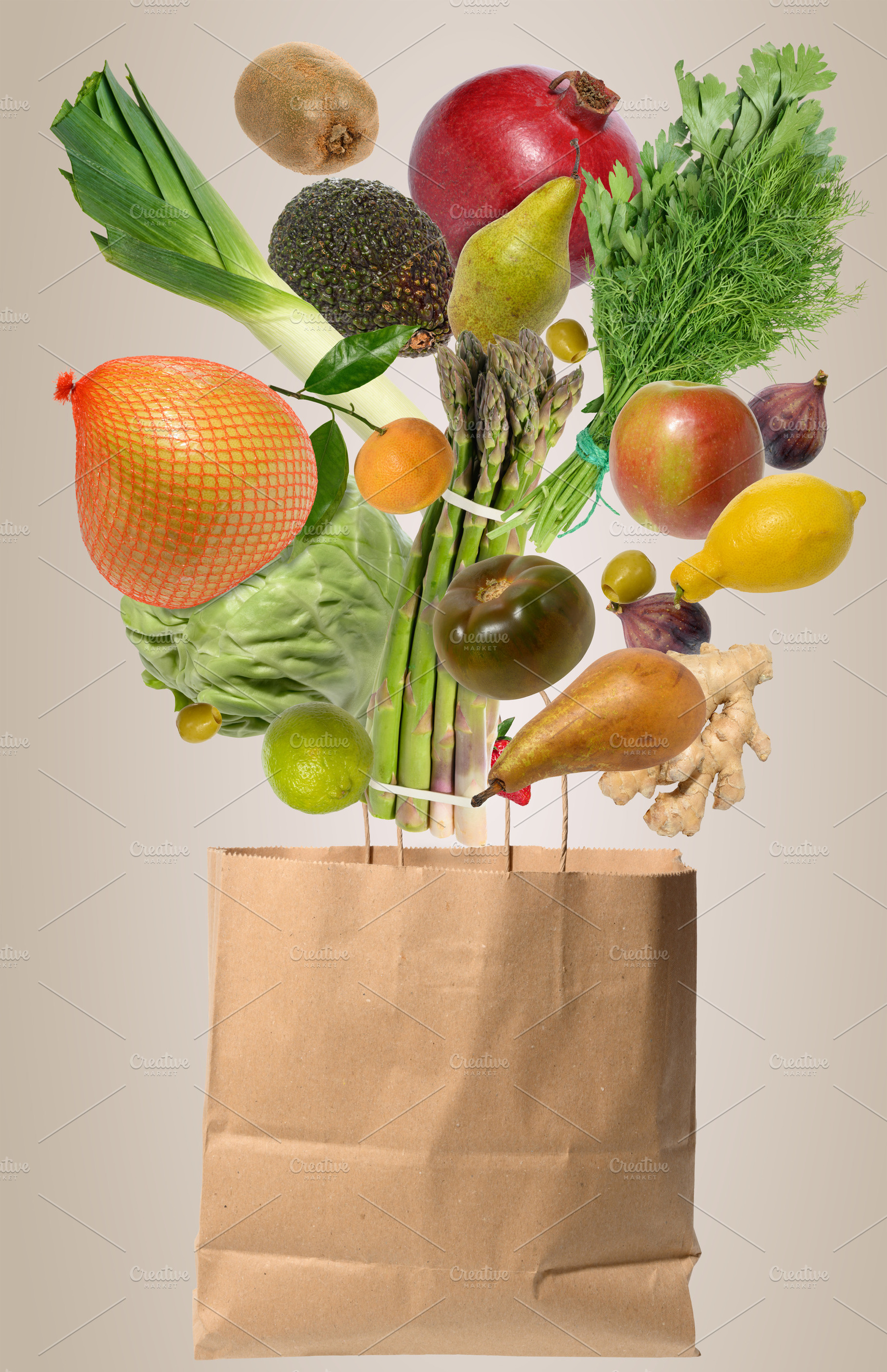 Levitating fresh vegetables and fruits flying out of a craft pap, a Food & Drink Photo by ndanko