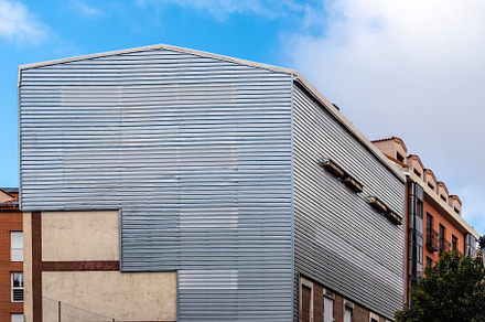 The closed steel facade of a building during restoration works