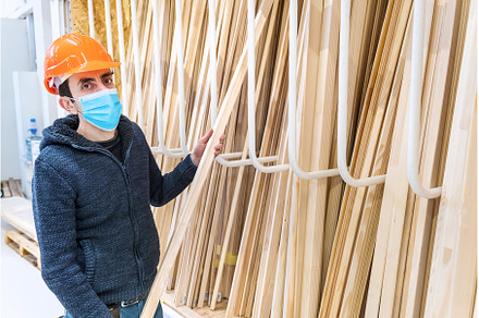 A man in a hardware store. Sells, a Person Photo by yanadjana