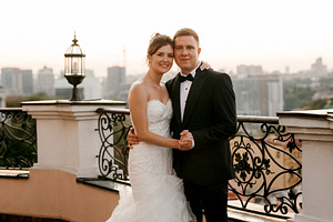 young couple bride and groom on the roof of a tall building agai, a Person Photo by Weddings, People, Travel
