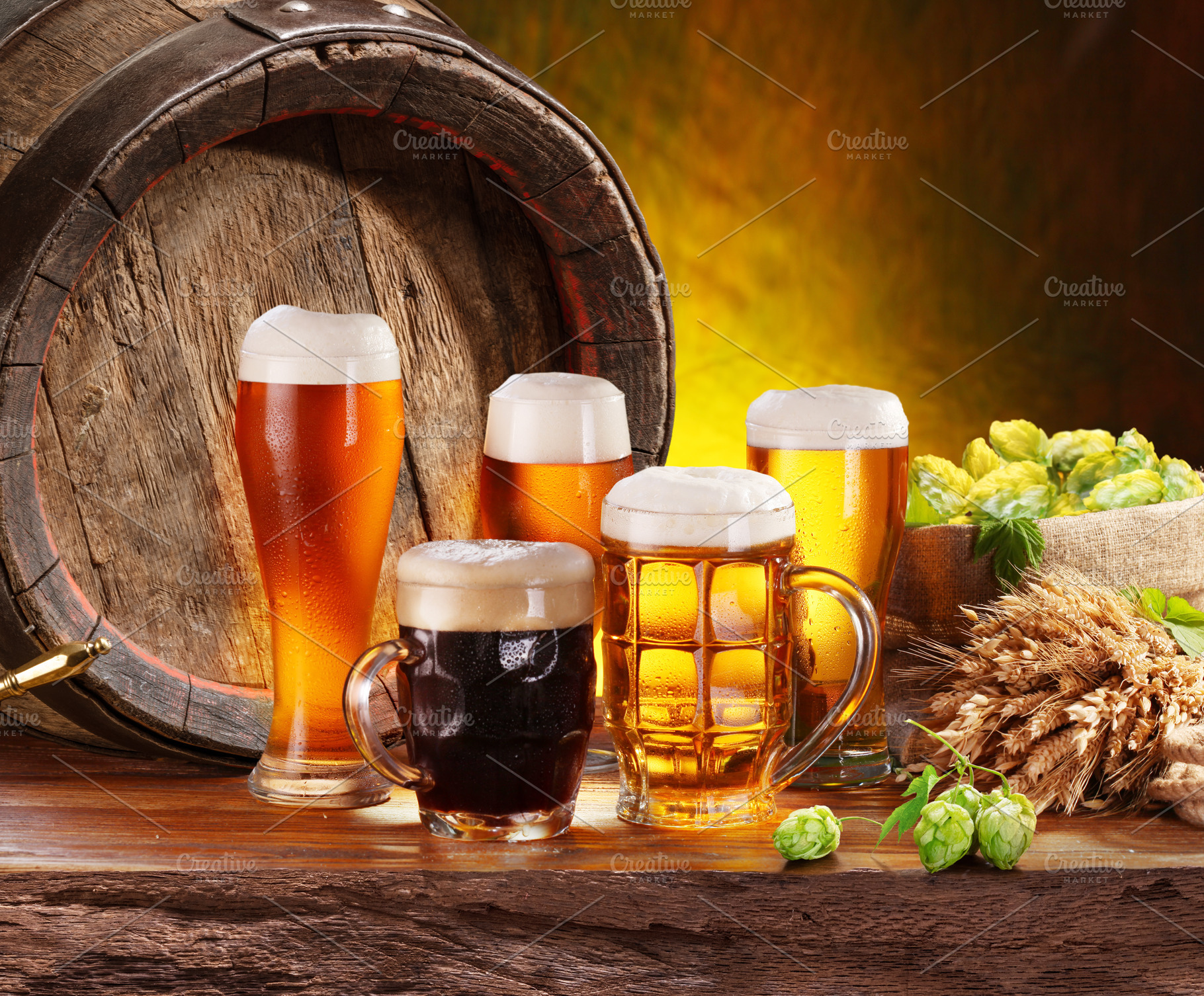 Glasses of chilled beer, wooden cask, a Food & Drink Photo by Volff