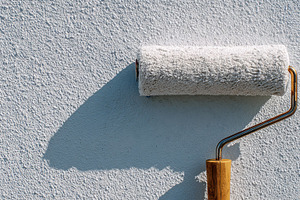 Painting a wall with a roller, a Photo by Beautiful things