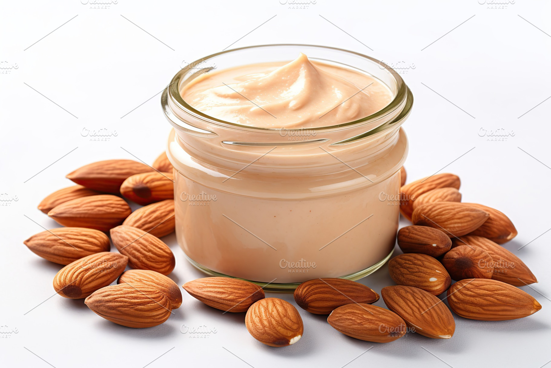 Glass jar of almond butter on white background, a Food & Drink Photo by AlyaAnd