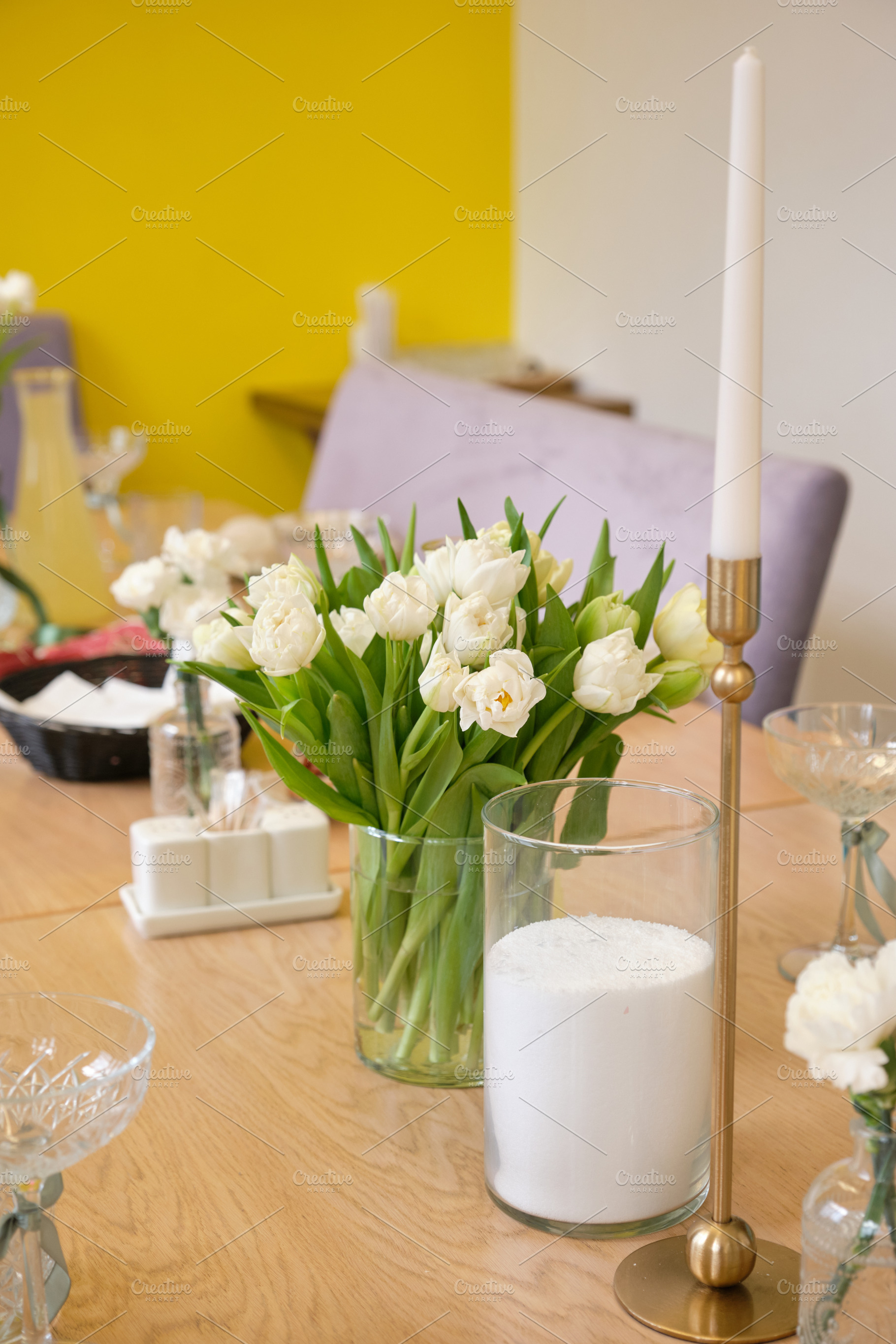 Elegant table setting with white tulips and decorative candle in modern interio, a Food & Drink Photo by Rohan Photography