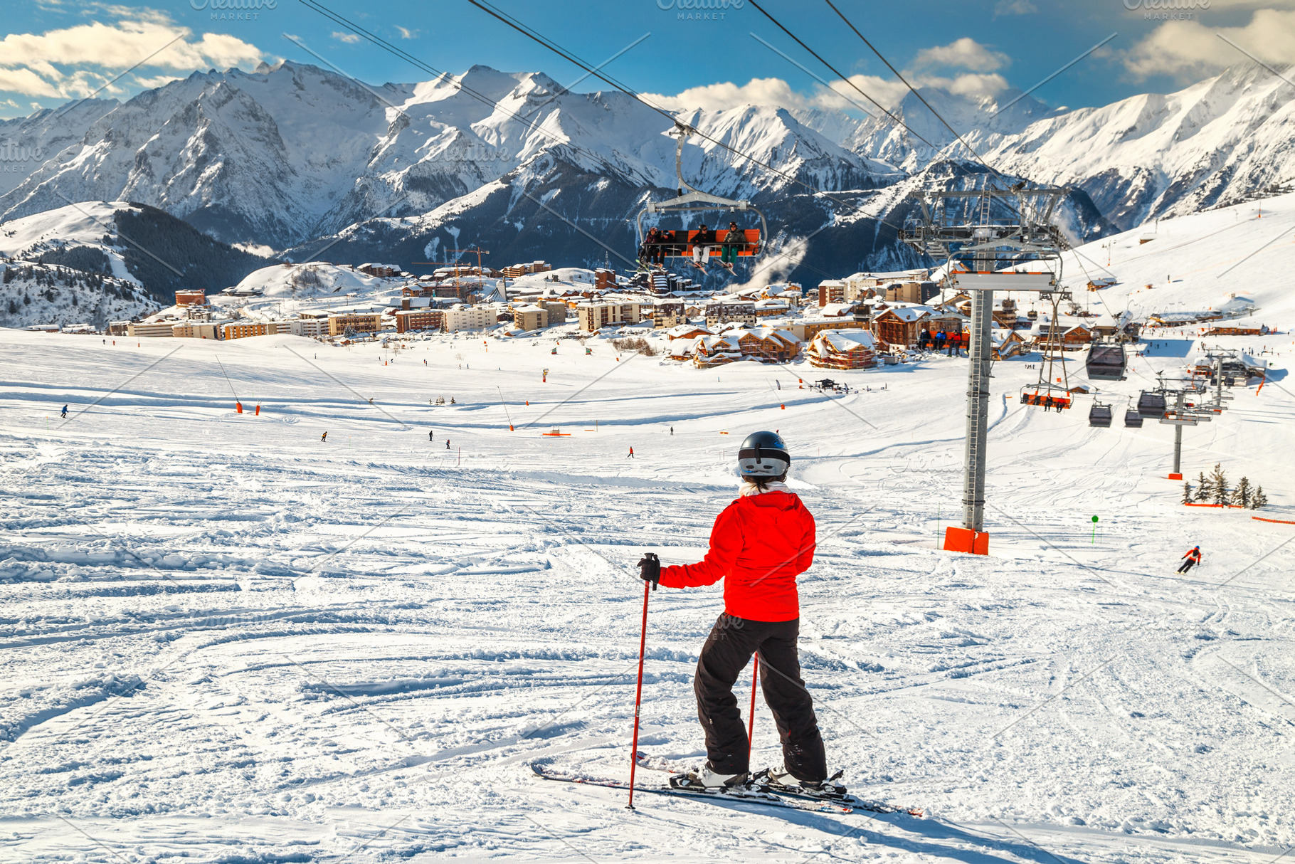 Skiers on the slope in French Alps, a Sports & Recreation Photo by Alpine Dreams