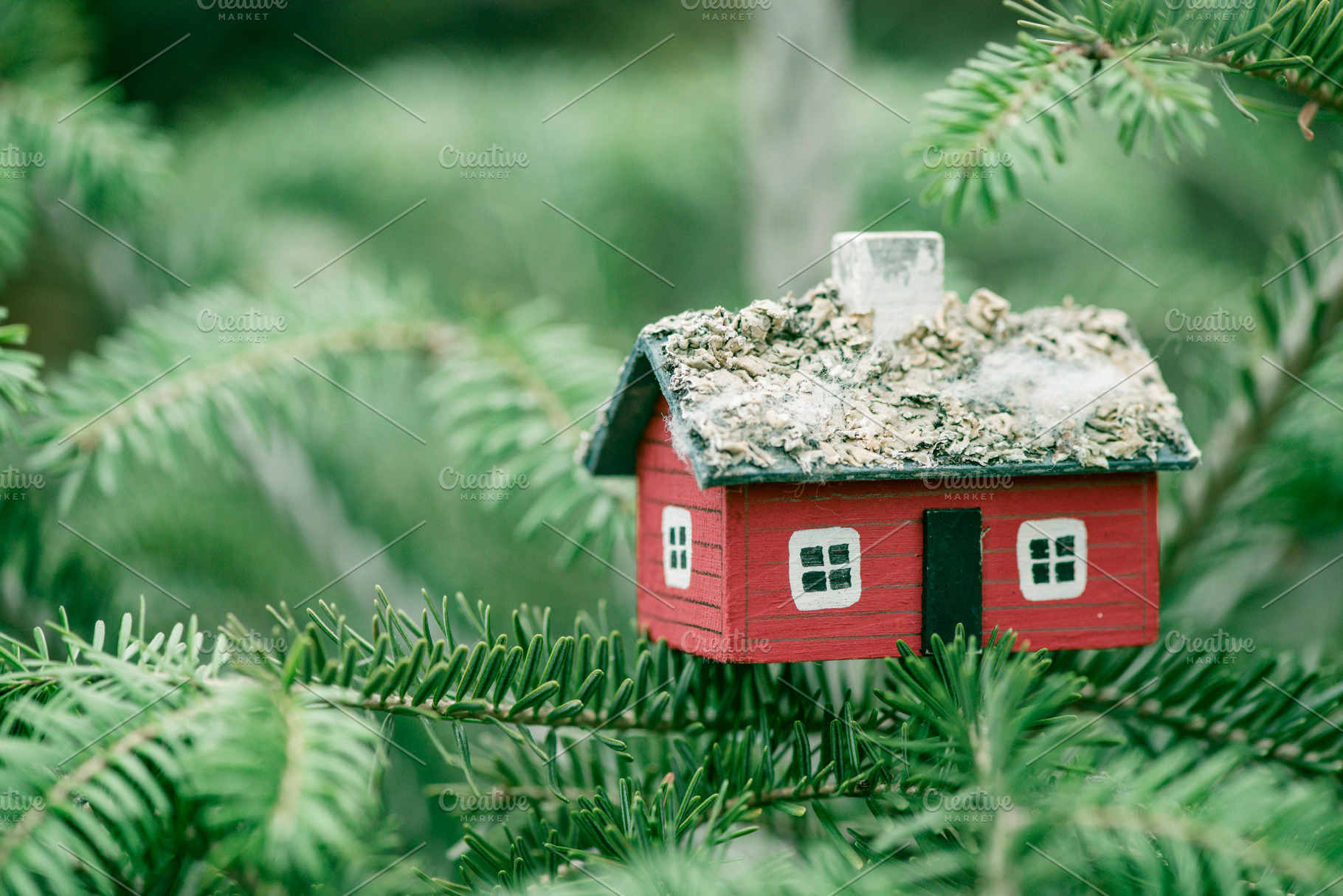 House miniature on fir tree stock photo containing christmas and tree, a Holiday Photo by DegImages