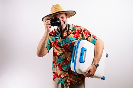 Smiling man ready for tropical vacation adventure