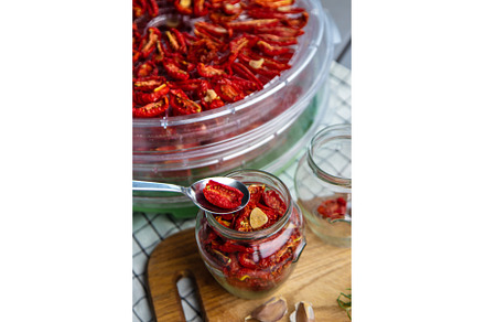 Sun-dried tomatoes are prepared for, a Food & Drink Photo by yanadjana