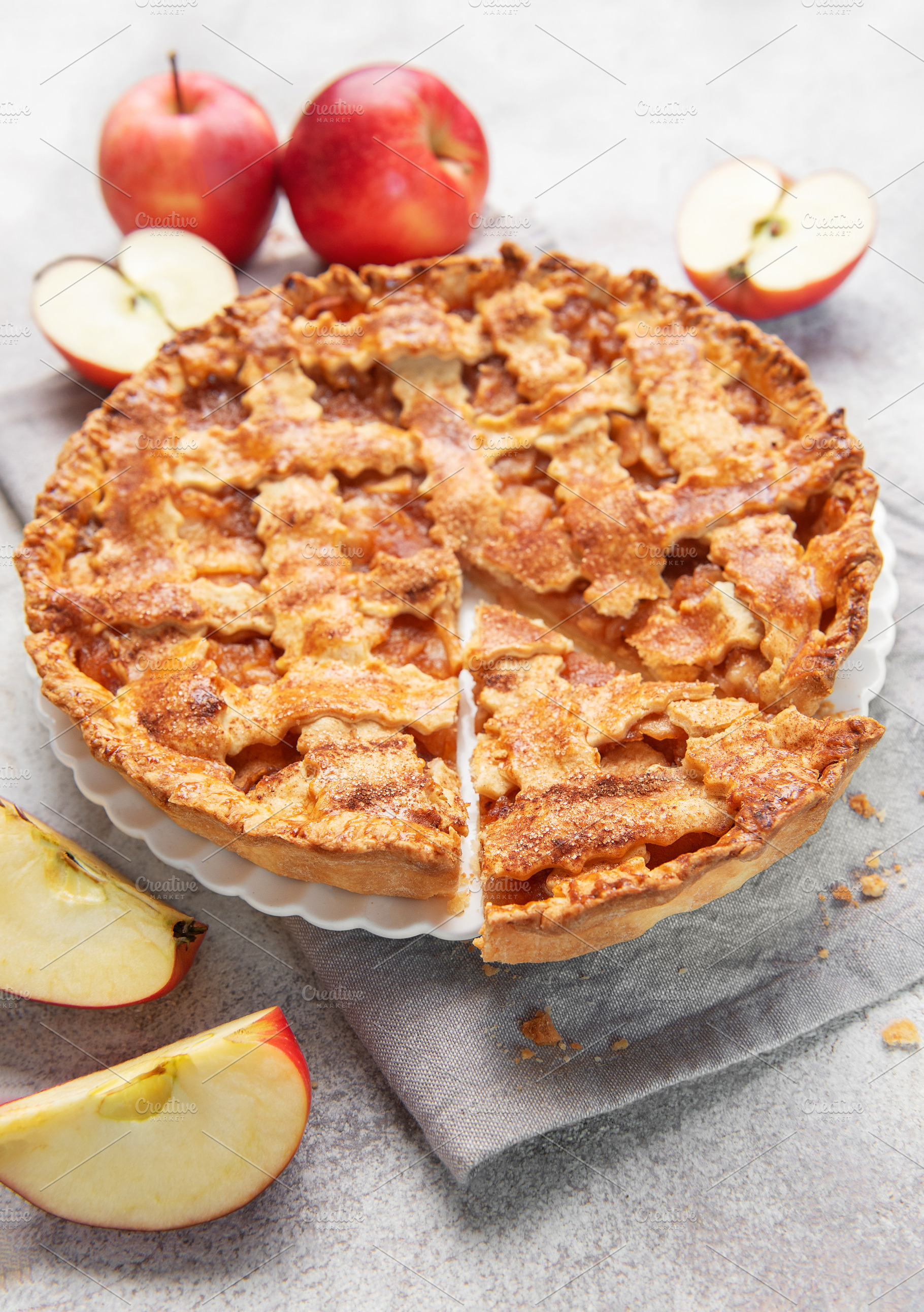 Apple pie with lattice crust and fresh apples, a Food & Drink Photo by Olena Rudo