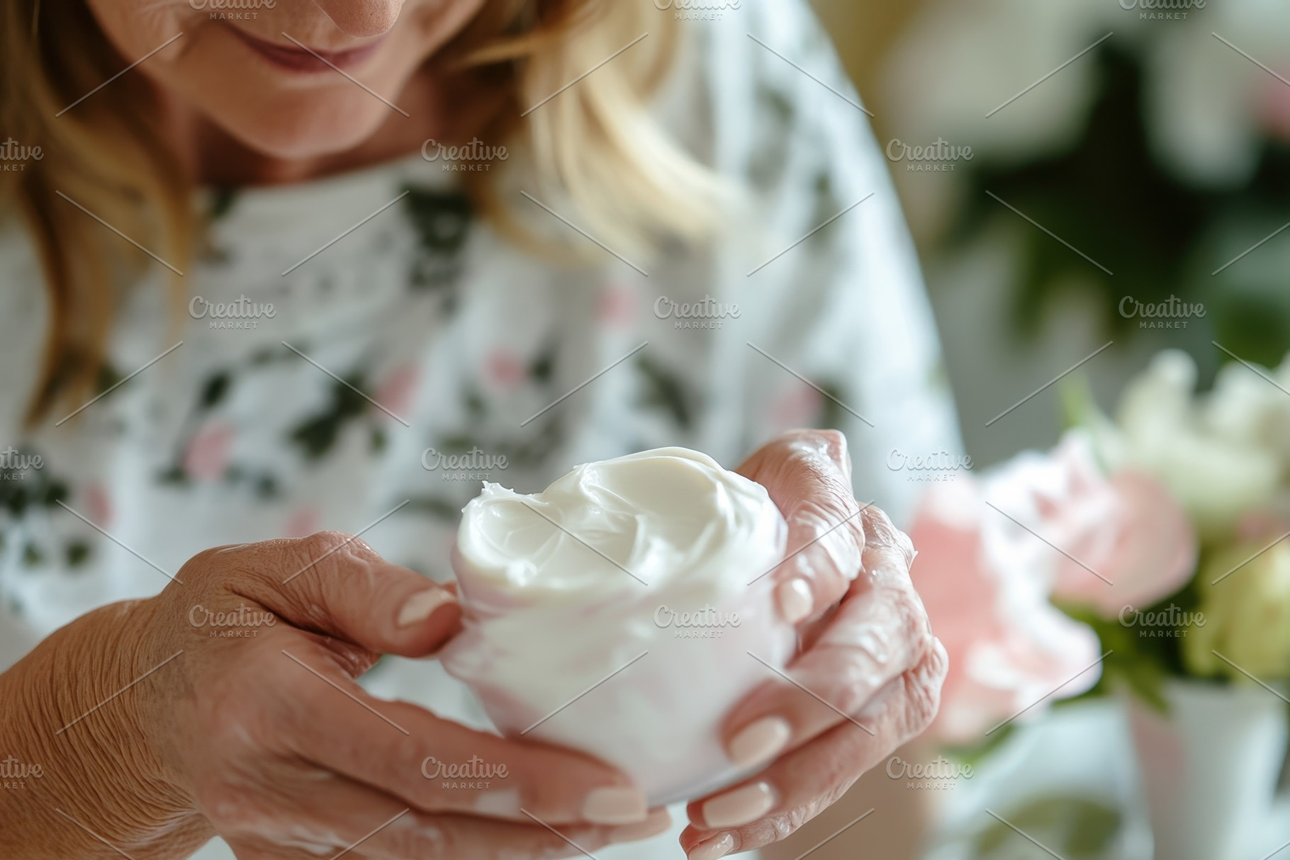 Mature woman carefully applying, a Photo by Pavel_design
