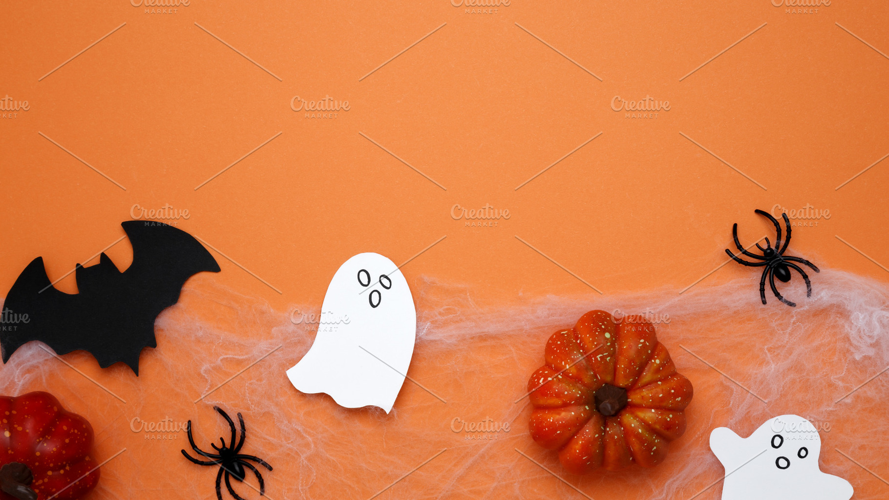 Spooky festive atmosphere. Halloween decoration pumpkins bats ghosts, a Photo by matucha