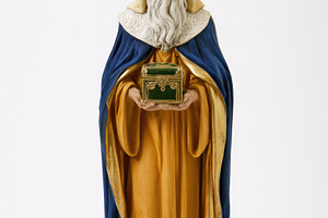 Melchior Three Wise Men figurine holding golden gift isolated on, a Food & Drink Photo by José Manuel Gelpi
