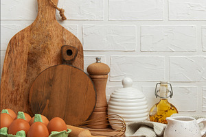 Kitchen utensils and food ingredients creating cozy culinary sce, a Food & Drink Photo by Olena Rudo