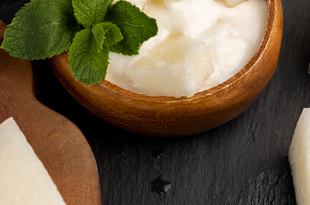 yogurt with melon flavor and ripe and delicious melon close-up, a Photo by MyPhotos