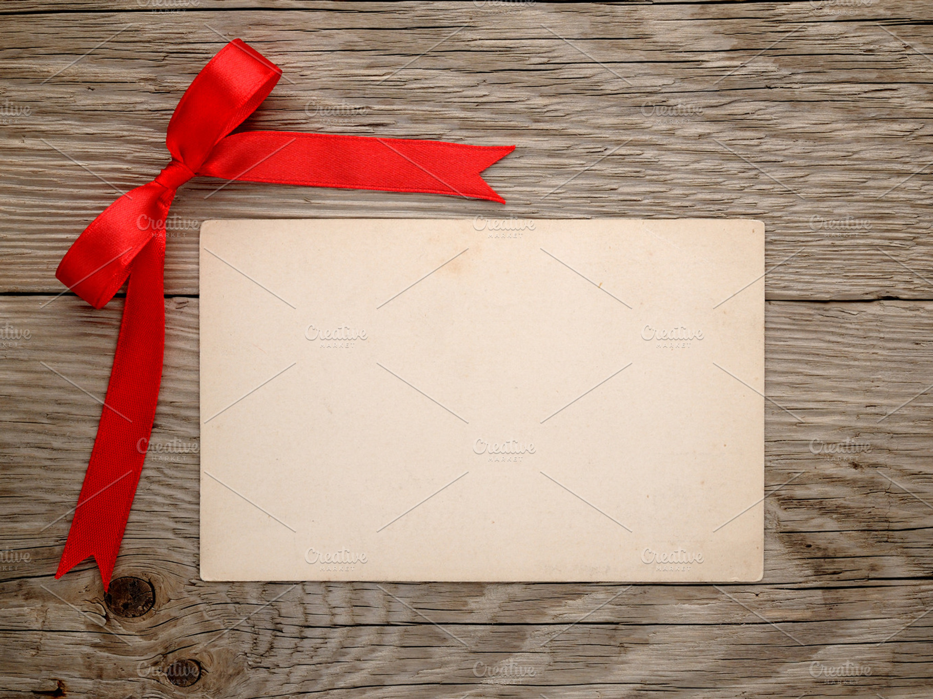 Red Bow And Vintage Postcard