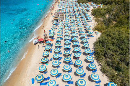 Aerial view of colorful umbrellas on, a Nature Photo by den-belitsky