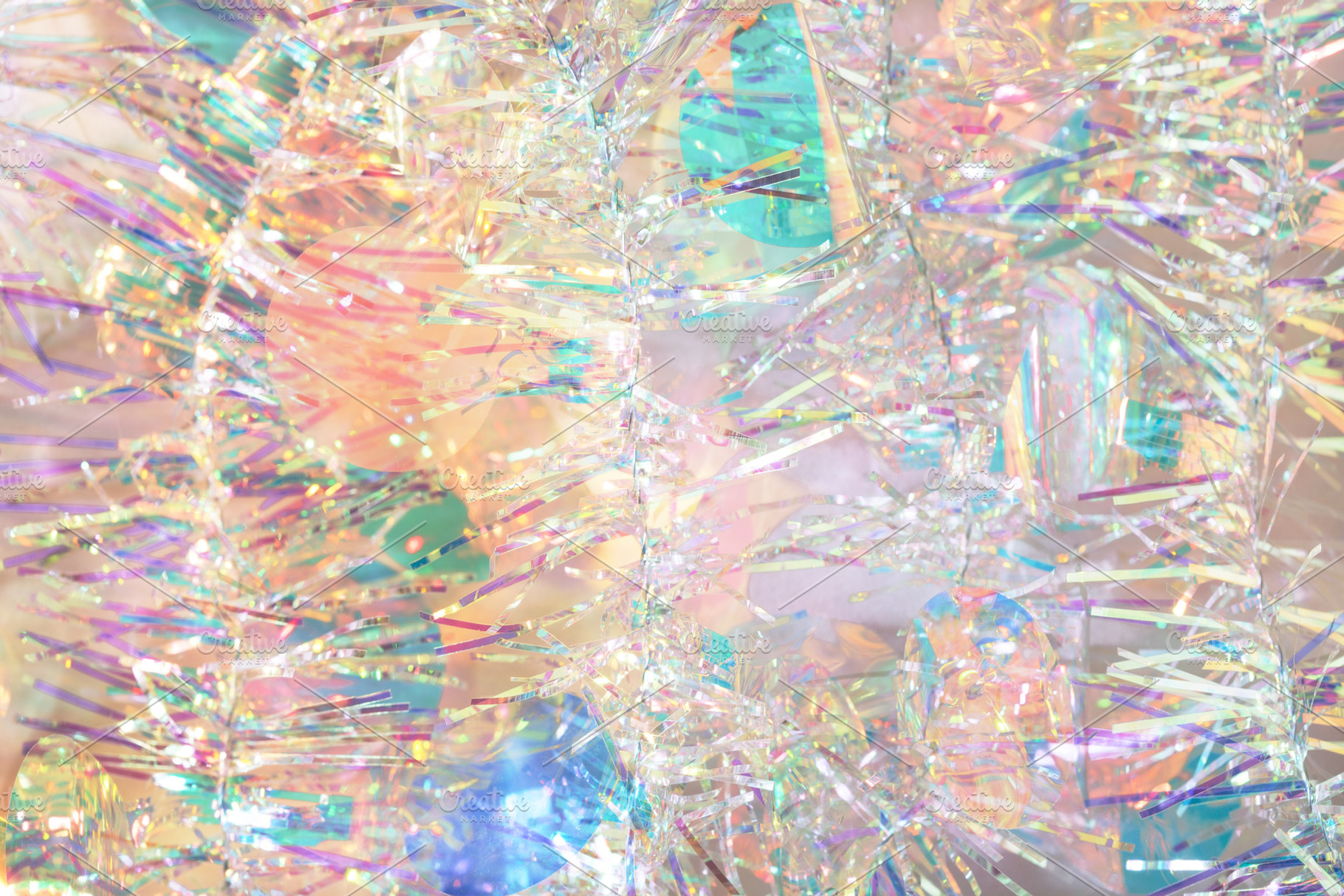 Iridescent Christmas tinsel garland, an Abstract Photo by Julia Manga
