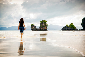 Beach Walking, a Person Photo by THP Creative