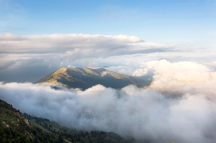 Top of the mountain above the clouds, a Nature Photo by Radiokafka