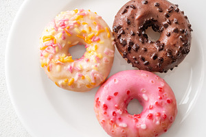 Pink white chocolate glazed donuеі, a Food & Drink Photo by Alexander Prokopenko