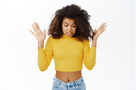 Portrait of shocked young woman