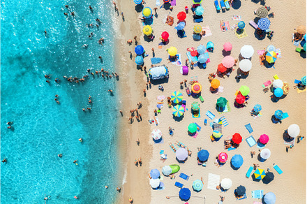Aerial view of colorful umbrellas on, a Nature Photo by den-belitsky
