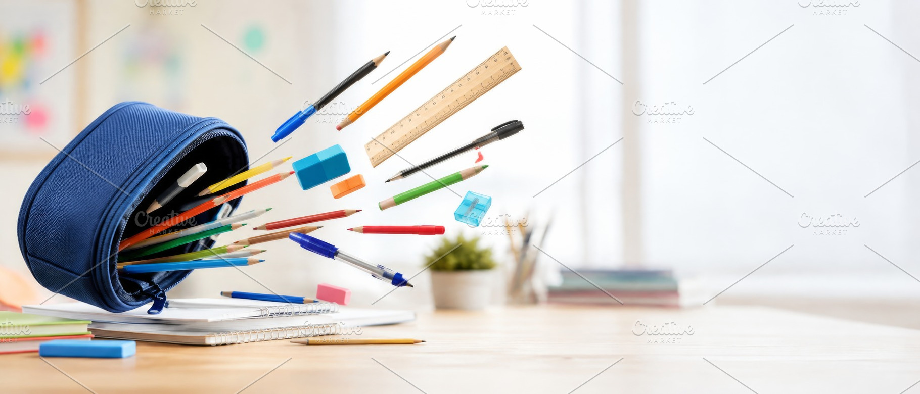 School supplies scattered across des, a Photo by Dvoevnore photos