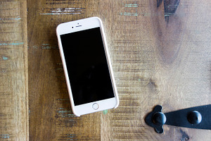 Iphone 6 plus on wood table featuring iphone, iphone6, and six