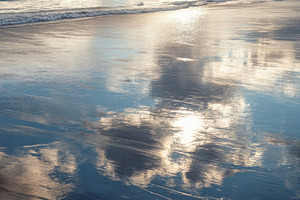 Wet Sand with Sky Reflections, a Nature Photo by Virgo Studio