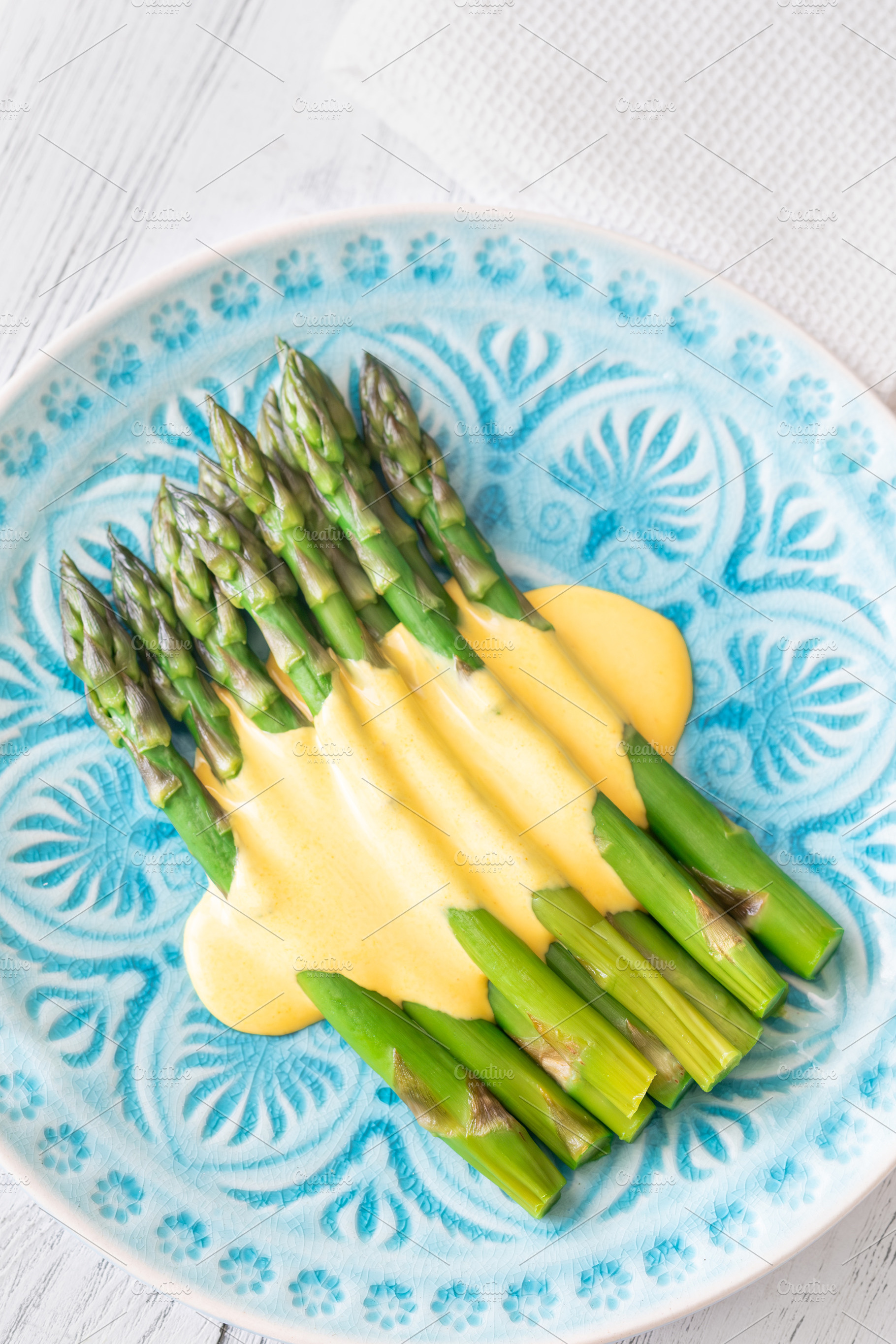 Blue Plate of Boiled Asparagus, a Food & Drink Photo by Alexander Prokopenko