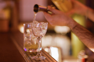 Cocktail making using jigger barman drink glass, a Food & Drink Photo by Photo Drive Studio