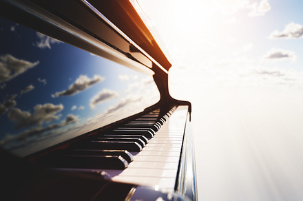 Grand piano keyboard on blue sky., an Arts & Entertainment Photo by Photocreo Michal Bednarek