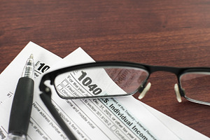 Documents on a table with glasses as, a Business Photo by 1miromiro