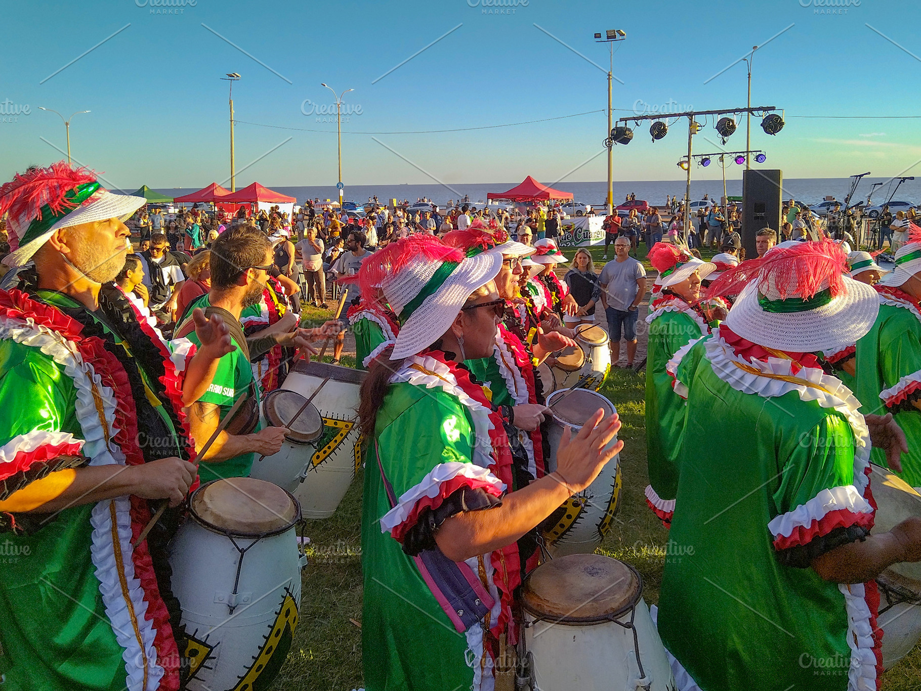 Candombe comparsa drummers playing at public space, montevideo c, a Person Photo by DanFLCreativo