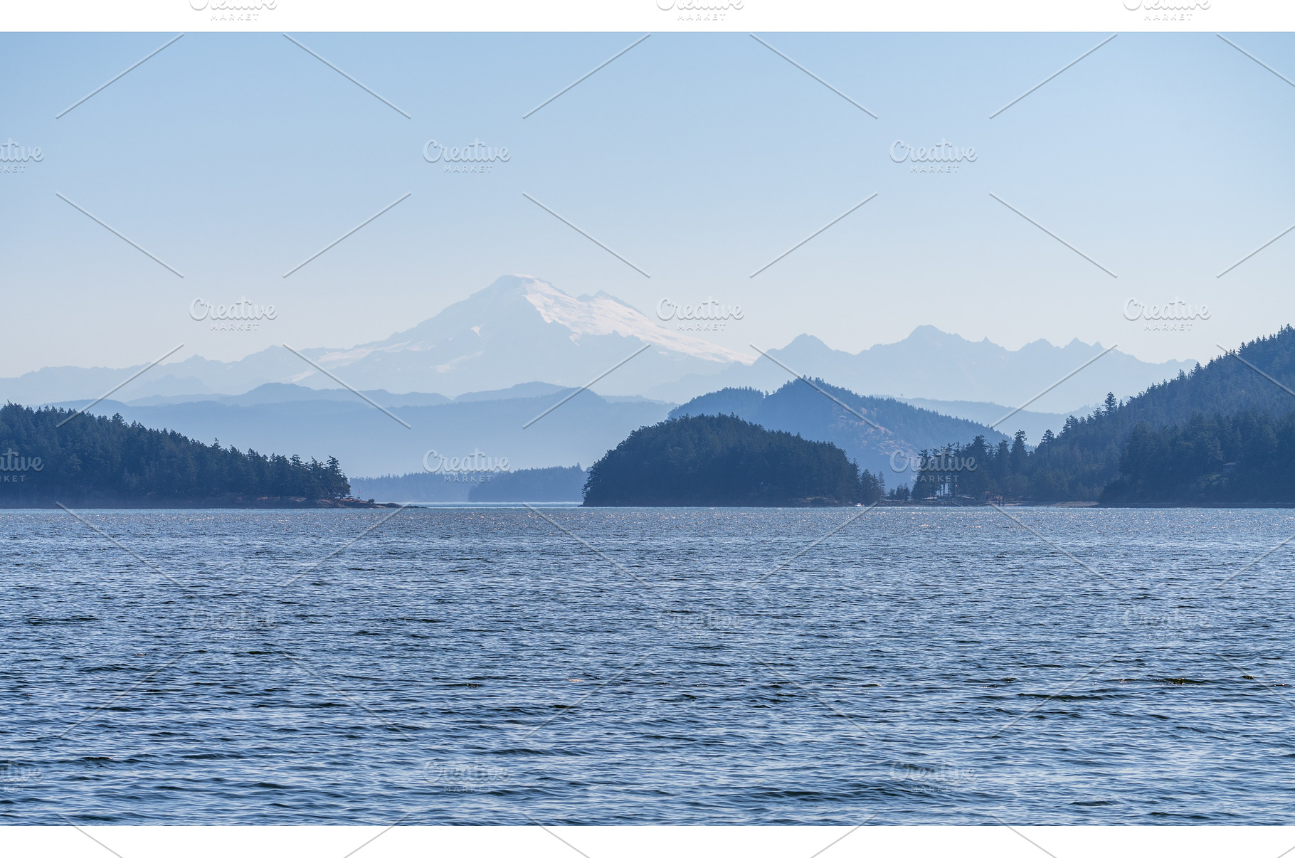 Shades of blue with Mt Baker in, a Nature Photo by Backyard Stock