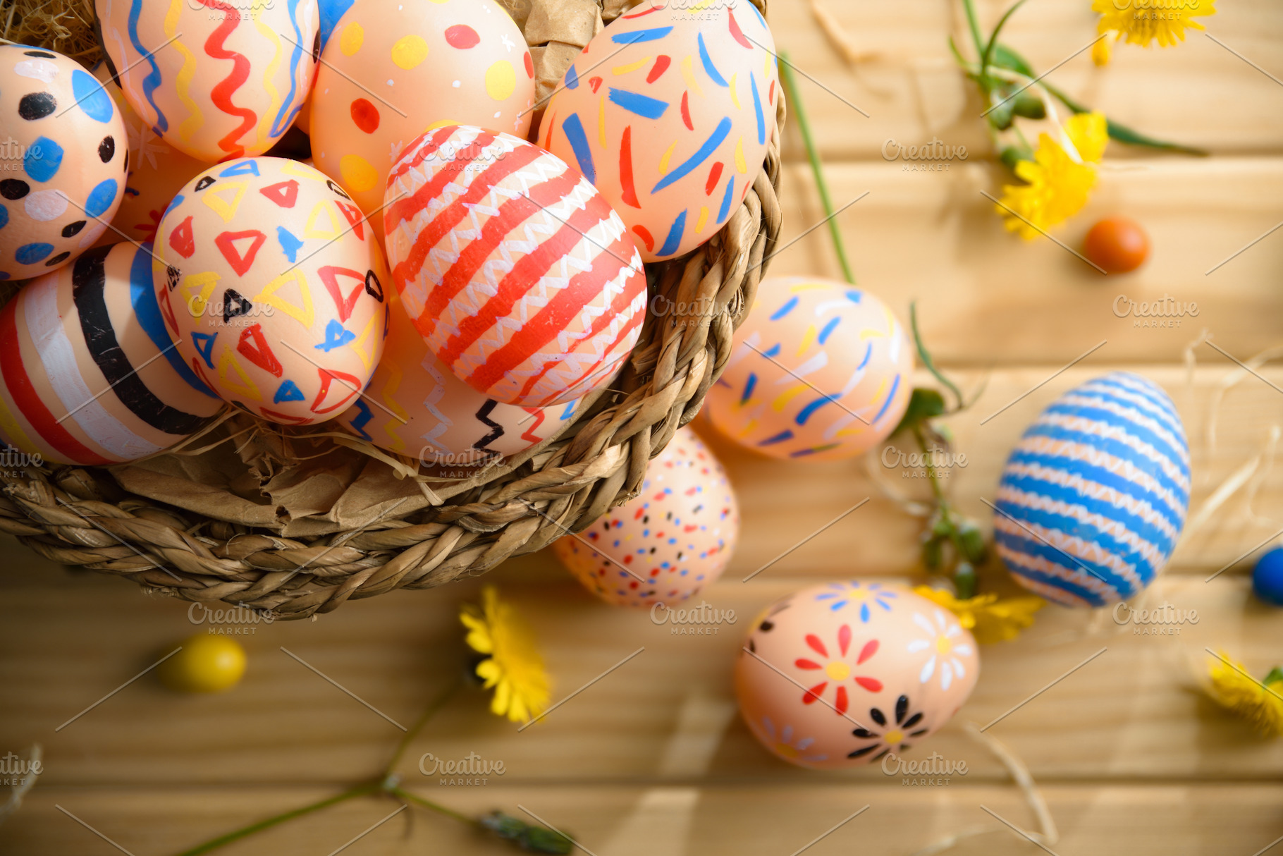 Colorful Hand-Painted Easter Eggs in Wicker Basket, a Holiday Photo by Davizro's Market