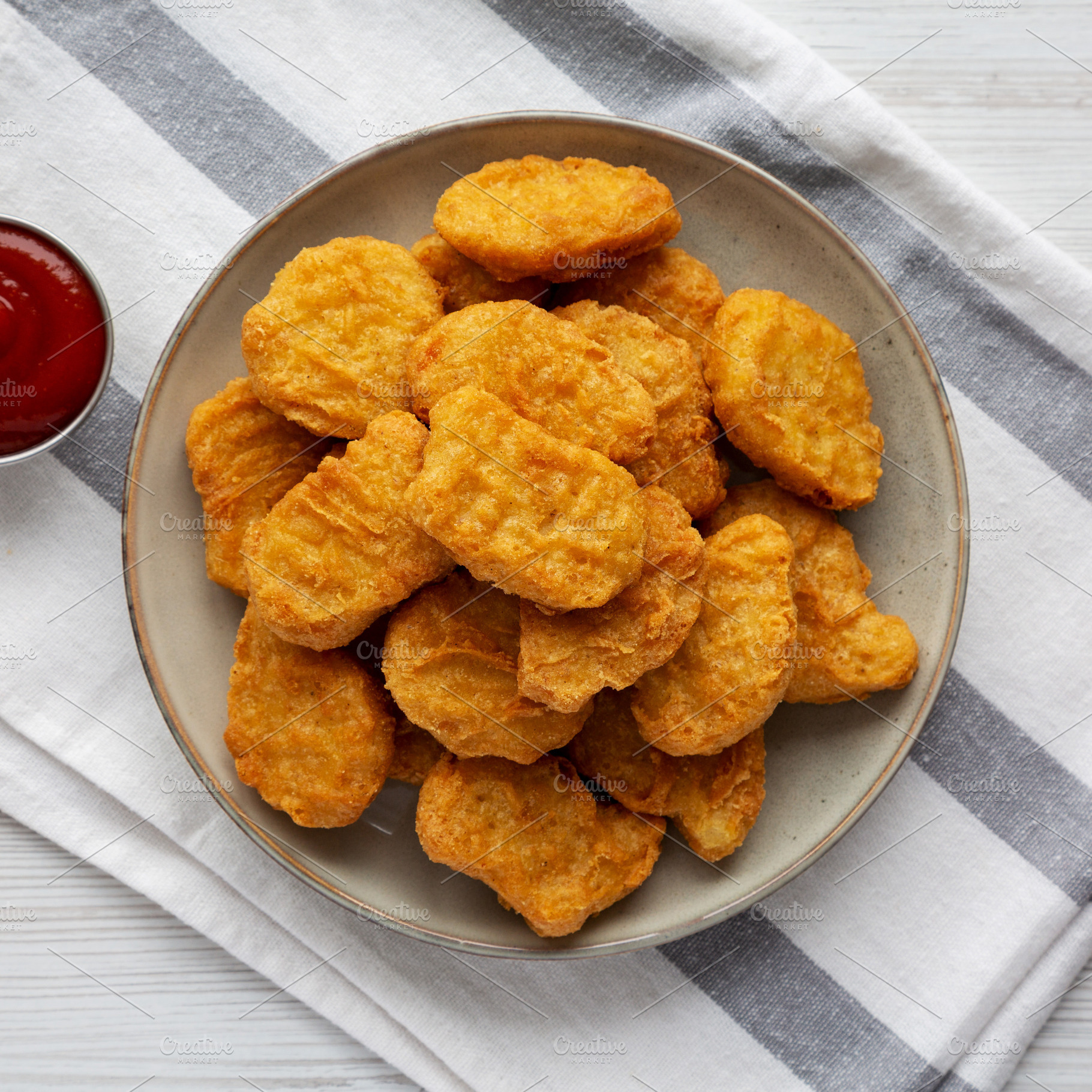 Homemade Chicken Nuggets with Ketchup, top view. Flat lay, overh, a Food & Drink Photo by LiudmylaChuhunova