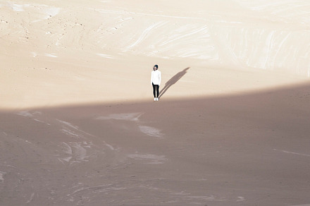 Sand dunes stock photo containing sand dunes and girl walking