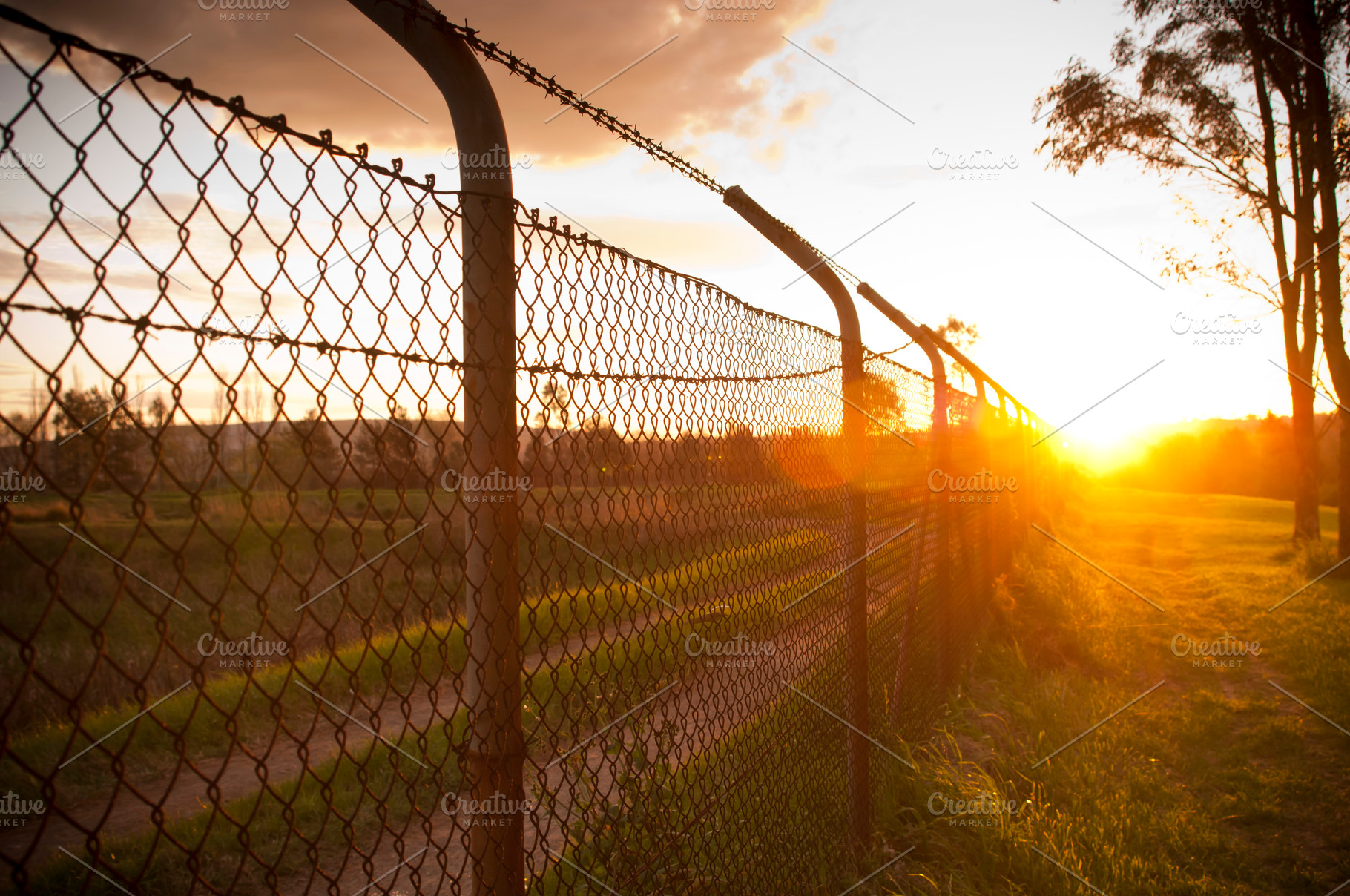 Sunset Fence, an Industrial Photo by THP Creative